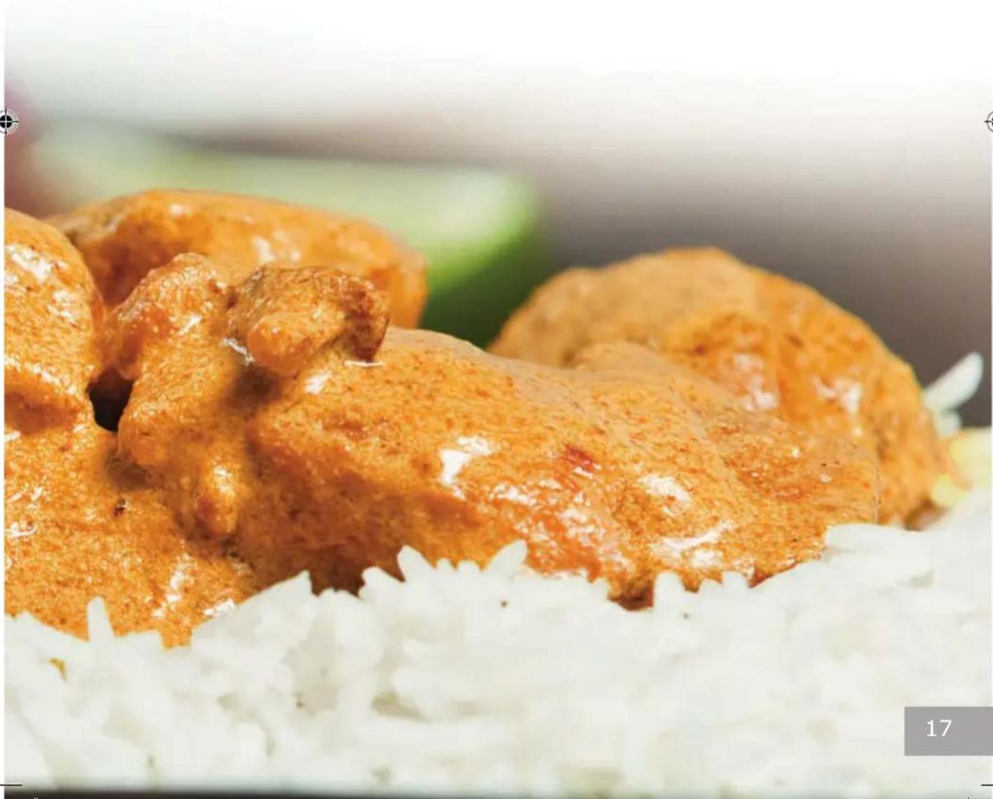 Close-up of golden-brown fried food items on a white rice dish (no text or symbols visible)
