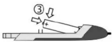 Diagram showing a battery being placed on a surface with labeled components and directional arrows