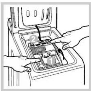 Diagram showing hands installing or adjusting a device with numbered components, likely for installation or repair instructions.