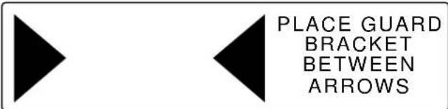 PLACE GUARD BRACKET BETWEEN ARROWS