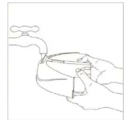 Line drawing of a hand holding a faucet with a small object inside (no text or symbols)