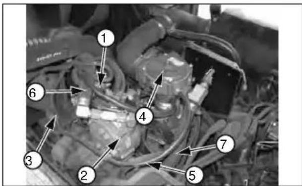 Labeled mechanical diagram showing numbered components of a vehicle engine or engine assembly