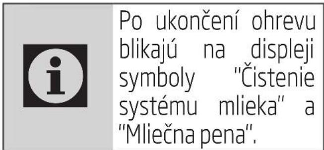 Po ukončení ohrevu blikajú na displeji symboly "Čistenie systému mlieka" a "Mliečna pena".