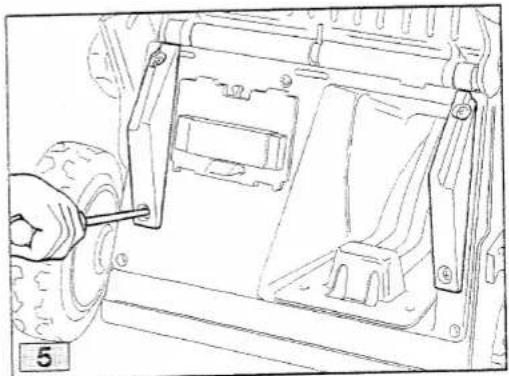Technical line drawing of a vehicle chassis with a hand operating the wheel (no text or symbols)