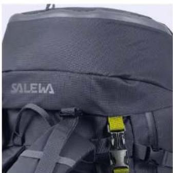 Close-up of a dark gray hiking backpack with 'SALEWA' branding and visible latches (no additional text or symbols)