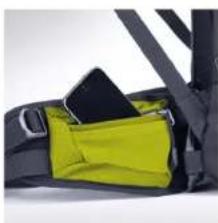 Close-up of a yellow and black safety belt buckle with a black strap (no text or symbols visible)