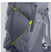Close-up of a gray jacket with yellow safety harnesses and black straps (no visible text or symbols)