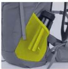 Close-up of a yellow and gray backpack with a black handle, no visible text or symbols