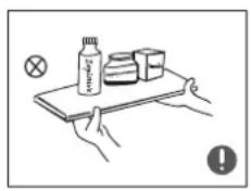 Illustration showing a hand holding a tray with a bottle, a cross, and a box, with an exclamation mark and a warning symbol.
