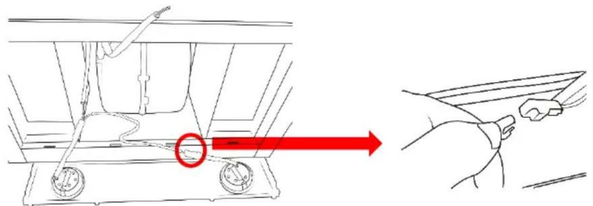 Diagram showing a hand holding a tool with a red arrow pointing to a component, indicating a process or operation.