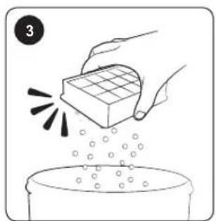 Illustration of hands pouring liquid from a cube into a container (no text or symbols)