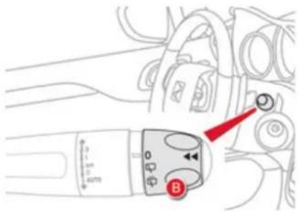 Diagram of a car interior with labeled controls and a red arrow pointing to component B