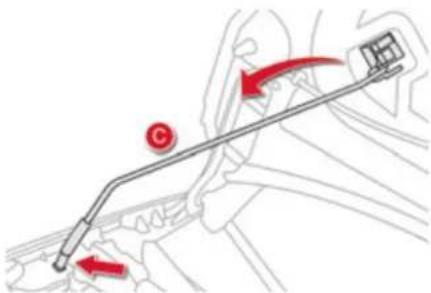 Diagram showing a mechanical lever mechanism with red arrows indicating motion or force directions, including a circular component labeled 'C' and a small inset image.