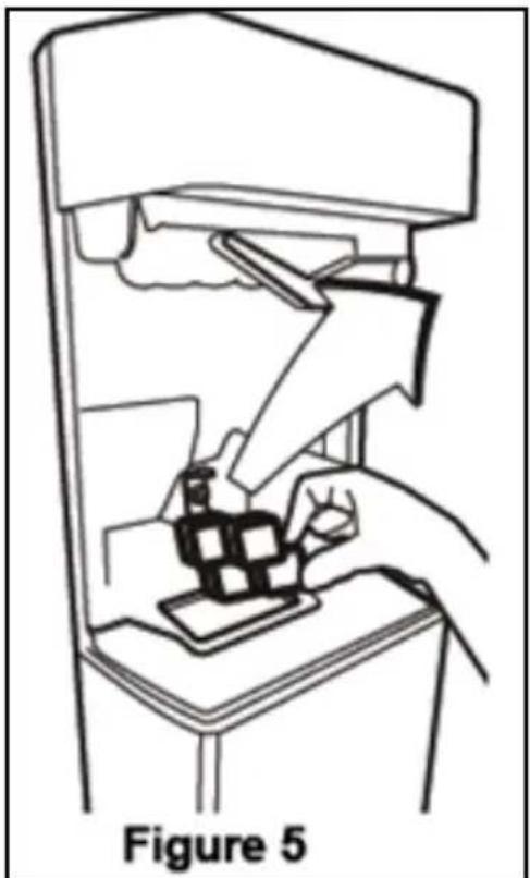 Line drawing of a hand using a tool to interact with a device, labeled Figure 5 (no text or symbols on the diagram itself)