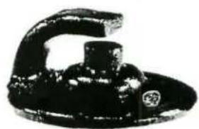 Black and white photo of a mechanical knob or dial (no visible text or symbols)
