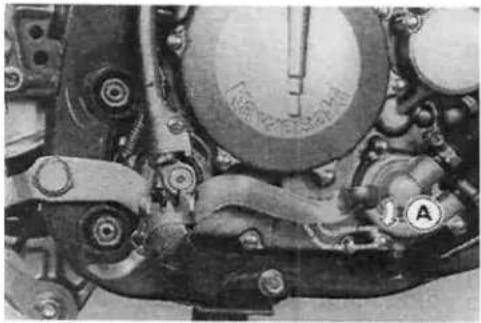 Close-up mechanical assembly with gears and a dial (no visible text or symbols)