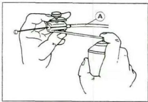 Illustration of two hands using a spray gun to apply liquid onto a cylindrical object (no text or symbols present)
