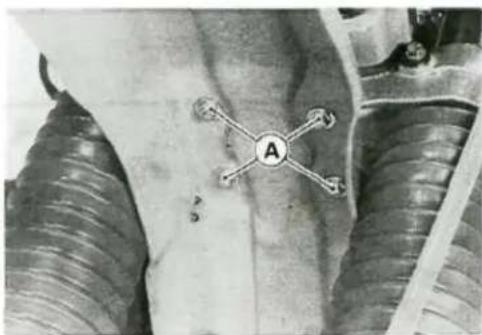 Close-up of a medical or surgical site with a marked point 'A' and surrounding tubing (no readable text or symbols)