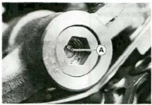 Close-up of a mechanical component with a hexagonal hole and labeled point A (no readable text or symbols)