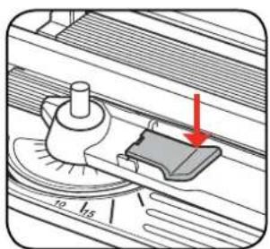 Technical diagram showing a mechanical component with labeled dimensions and an arrow indicating direction