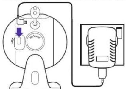 Diagram showing a device with labeled buttons and a connected charger, likely illustrating a power or control system setup.