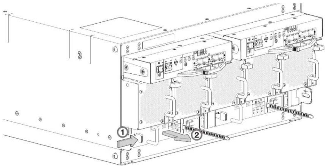 Technical diagram of an internal network device with labeled ports and connectors, showing two numbered components.
