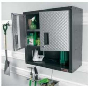 Interior view of a wall-mounted industrial equipment cabinet with green fixtures and metal panels (no visible text or labels)