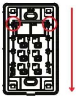 Diagram of a rectangular device with internal components and two red circles highlighting specific areas, accompanied by a downward arrow.