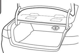 Line drawing of a car interior showing the rear compartment and side compartments (no text or symbols)