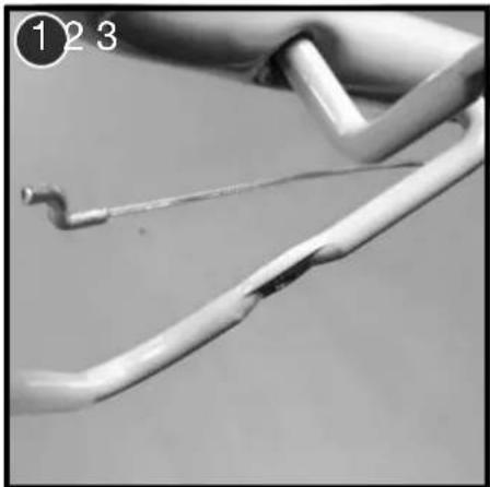Close-up of a damaged cable with visible cracks and a damaged end (no text or symbols)