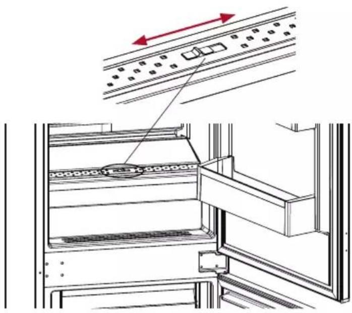 Technical diagram showing a rack with labeled components and directional arrows indicating movement or flow.