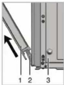 Technical diagram showing a mechanical assembly with numbered components and an arrow indicating direction