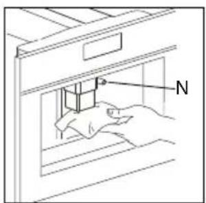 Diagram showing a hand inserting a component into a device labeled 'N', likely illustrating a magnetic or electrical concept.