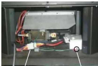 Interior view of a 3D printer or scanner module showing wiring, connectors, and components (no visible text or symbols)