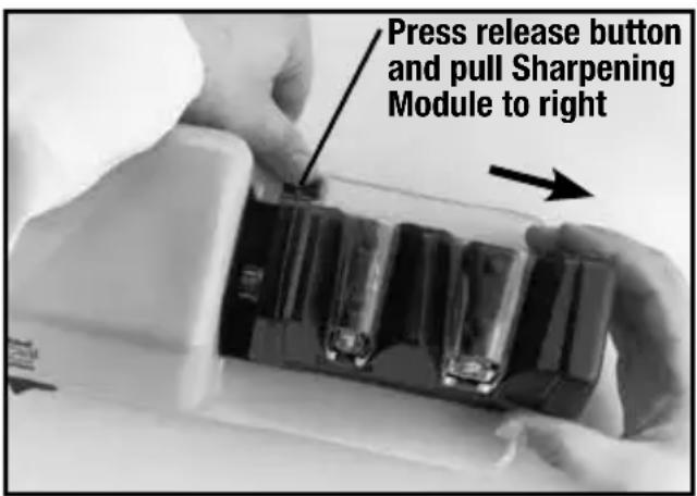 Press release button and pull Sharpening Module to right
