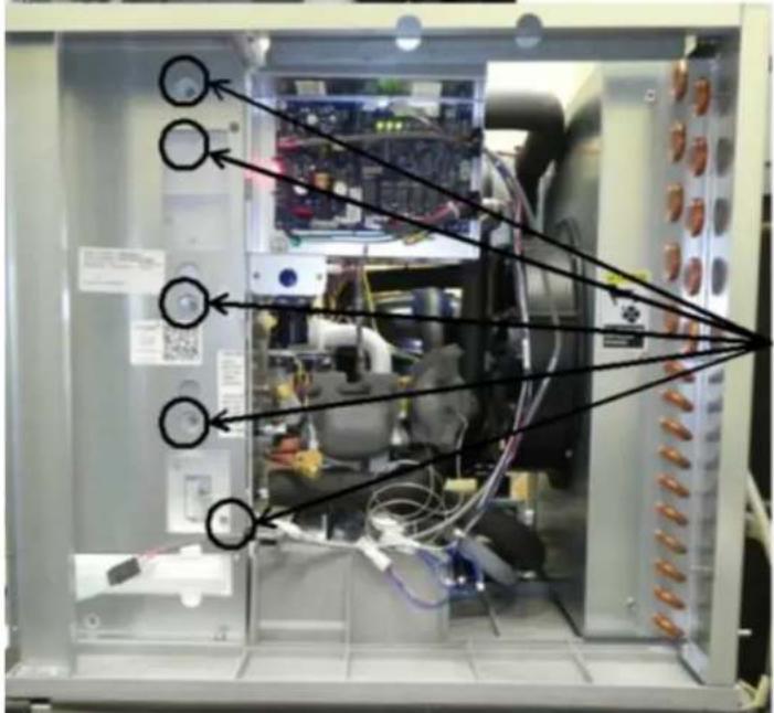 Internal view of an electronic device with labeled components and annotations pointing to internal wiring or connections.