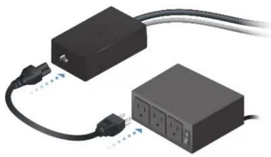 Two black electrical connectors connected by wires, one with a plug and cable, the other with three switches (no text or symbols visible)