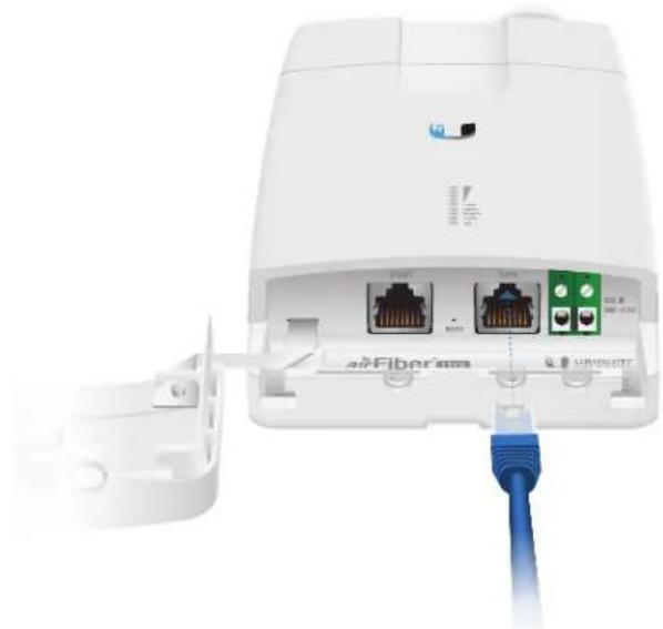 White wireless router with attached network ports and a blue cable (no visible text or symbols)