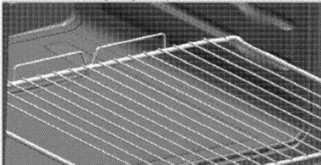 Close-up of a metal grate with horizontal slats and a grid pattern (no text or symbols visible)