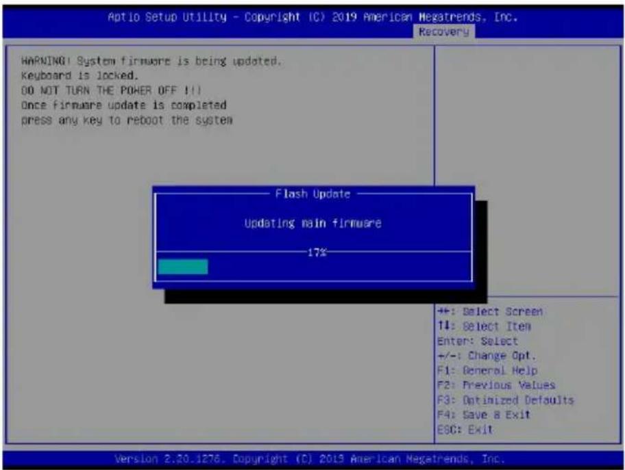 Aptio Setup Utility - Copyright (C) 2019 American Megatrends, Inc. Recovery WARNING! System firmware is being updated. Keyboard is locked. DO NOT TURN THE POWER OFF !!! Once firmware update is completed press any key to reboot the system Flash Update Updating main firmware 17% ++: Select Screen 14: Select Item Enter: Select +/-: Change Opt. F1: General Help F2: Previous Values F3: Optimized Defaults F4: Save & Exit E9C: Exit Version 2.30.1276. Copyright (C) 2019 American Megatrends, Inc.