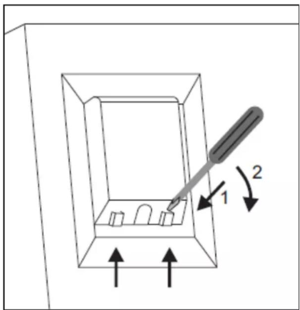 Diagram showing a tool interacting with a box containing small objects, labeled with arrows and numbered parts 1 and 2.