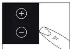 Diagram showing a hand pointing at a black panel with plus and minus signs, likely indicating a button or interface.
