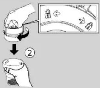 Diagram illustrating a hand holding a small object with a magnified inset showing a device and directional arrows, labeled with step ②.