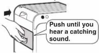 Push until you hear a catching sound.