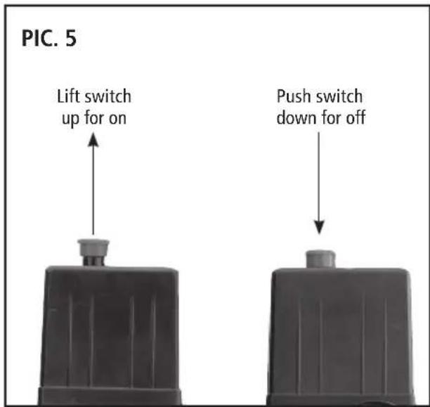 PIC. 5 Lift switch up for on Push switch down for off