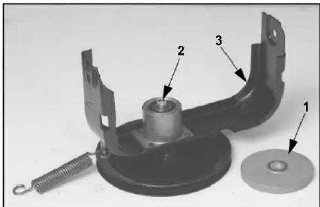 Technical diagram of a mechanical assembly with labeled parts 1, 2, and 3, including a spring and washer.