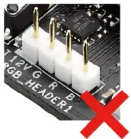 Close-up of a circuit board with three white 3-pin connectors and a red X symbol (no readable text or symbols)