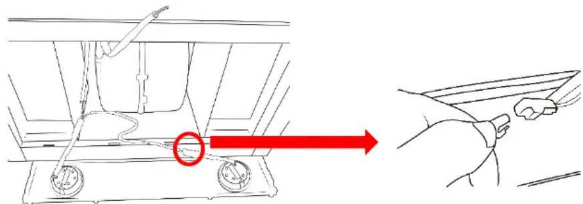 Diagram showing a hand holding a device with a red arrow indicating direction, alongside a mechanical component with two circular features.