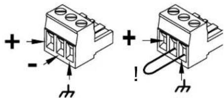 Diagram showing two electrical connector pin configurations with polarity indicators and connection points
