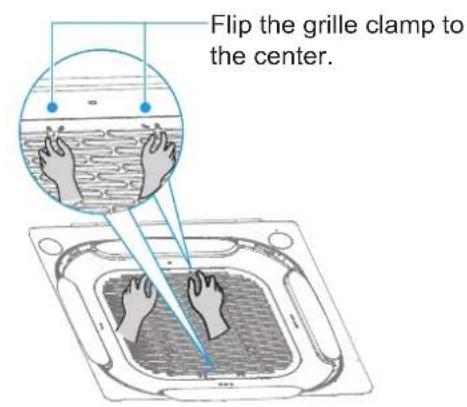 Flip the grille clamp to the center.